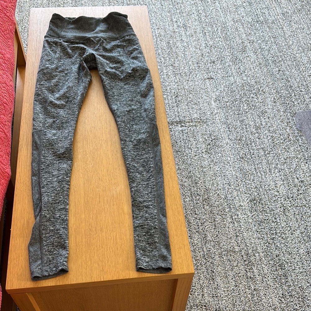 Athleta exhale heel tight with pockets size extra small